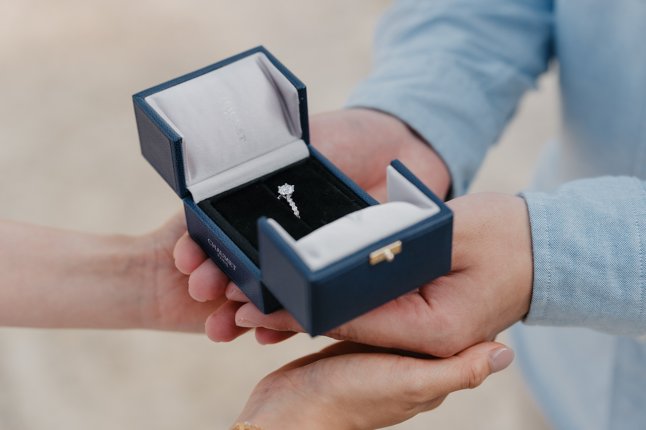 Ring box opened in his hands just before the proposal