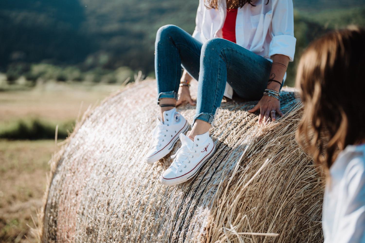 Legs on the hay bale