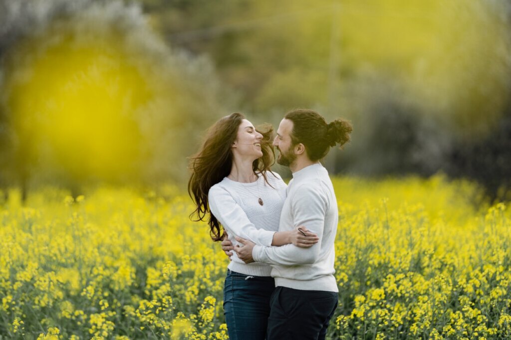 A hug among the yellow flowers